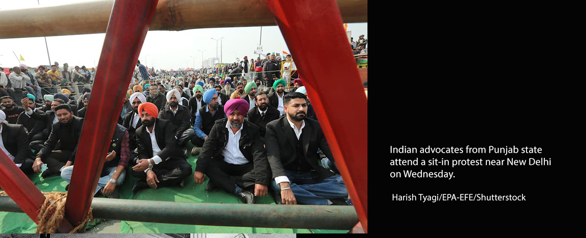 Indian advocates from Punjab state attend a sit-in protest near New Delhi on Wednesday.