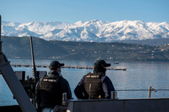 SOUDA BAY, Greece (Feb. 20, 2021) Gunner’s Mate 3rd Class Bradley Holloway, right, and Fire Controlman 2nd Class Matthew Hayes man a M2HB .50-caliber machine gun as the Arleigh Burke-class guided-missile destroyer USS Donald Cook (DDG 75) departs Souda Bay, Greece, Feb. 20, 2021.