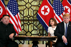 North Korean leader Kim Jong Un and U.S. President Donald Trump listen to questions from the media during their one-on-one bilateral meeting at the second North Korean-U.S. summit in the Metropole hotel in Hanoi, Vietnam, February 2019. 