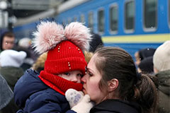 Refugees fleeing Russia's invasion of Ukraine in Lviv, March 2022 Kai Pfaffenbach / Reuters