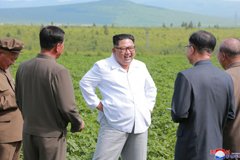 North Korean leader Kim Jong Un inspects Chunghung farm in Samjiyon County, North Korea in this undated photo released by North Korea's Korean Central News Agency (KCNA), July 2018.