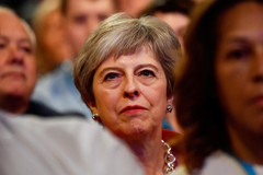 Britain's Prime Minister Theresa May sits in the audience at the start of the Conservative Party Conference in Birmingham, Britain September 30, 2018. REUTERS/Toby Melville 