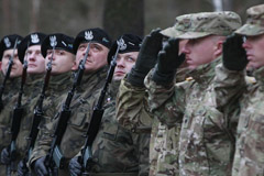 U.S. Army soldiers are welcomed in Zagan, Poland, Thursday, Jan. 12, 2017. 