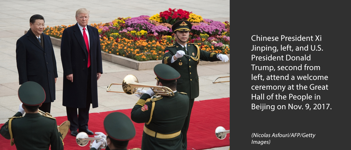 Chinese President Xi Jinping, left, and U.S. President Donald Trump, second from left, attend a welcome ceremony at the Great Hall of the People in Beijing on Nov. 9, 2017.