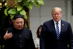 North Korea's leader Kim Jong Un and U.S. President Donald Trump talk in the garden of the Metropole hotel during the second North Korea-U.S. summit in Hanoi, Vietnam Feb. 28, 2019. REUTERS/Leah Millis/File Photo