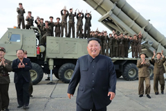 An image released by North Korea’s state news agency showing the country’s leader, Kim Jong-un, celebrating what was purportedly the test-firing of a new rocket launcher last month.CreditCreditKorean Central News Agency