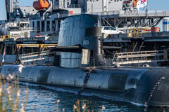 A Collins-class guided missile submarine is moored at Royal Australian Navy base HMAS Stirling, Australia. U.S. NAVY / MASS COMMUNICATION SPECIALIST 2ND CLASS JEANETTE MULLINAX