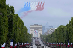 The Bastille Day military parade in Paris in July.