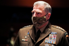 General Mark A. Milley is the 20th Chairman of the Joint Chiefs of Staff, the nation's highest-ranking military officer, wearing a mask.