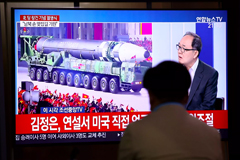 A man watches a television showing North Korea’s military parade while at the Seoul Railway Station on October 10, 2020, in Seoul, South Korea. Chung Sung-jun/Getty Images