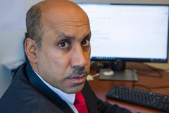  In this Oct. 26, 2018, photo Ali AlAhmed poses for a photograph in his office in Washington. Hackers are impersonating reporters in a bid to intercept the communications of the prominent Saudi opposition figure in Washington. An Associated Press review of malicious emails sent to AlAhmed shows he was approached by hackers masquerading as a BBC reporter and as Washington Post columnist Jamal Khashoggi, who was killed last month at the Saudi consulate in Istanbul.