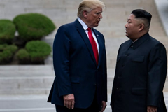 President Donald Trump and North Korea’s leader Kim Jong-un stand on North Korean soil while walking to South Korea in the Demilitarized Zone (DMZ) on June 30, 2019, in Panmunjom, Korea.