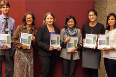 Members of the delegation deliver mercury science policy briefs, developed by the 13th annual International Conference on Mercury as a Global Pollutant (ICMGP), to Minamata delegates.