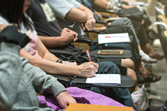 Students taking notes