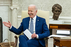 President Biden with Afghanistan war in background